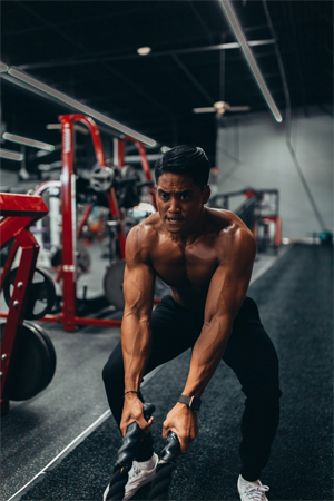 Image of man on pulling machine