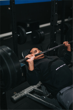 Image of man doing arm exercises